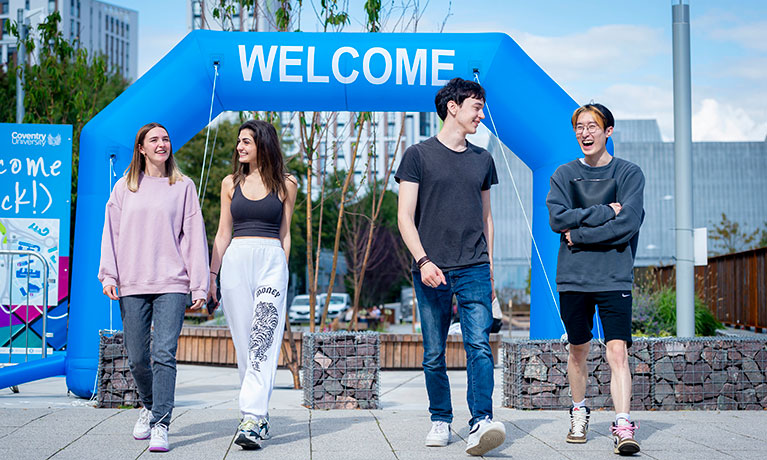 Students walking together at an event.