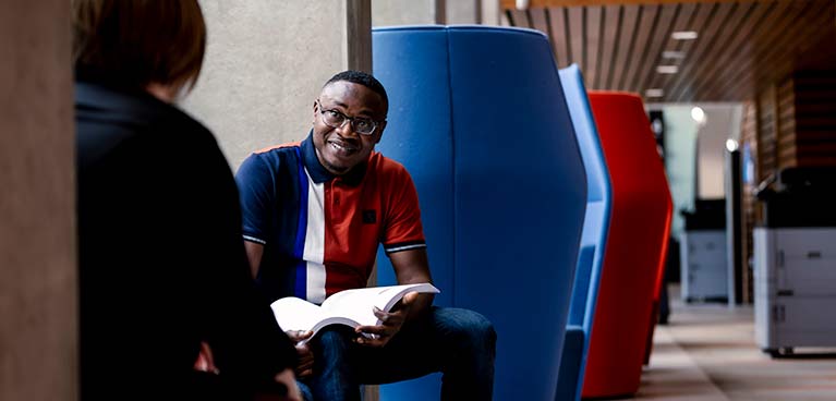 Students talking in a common room