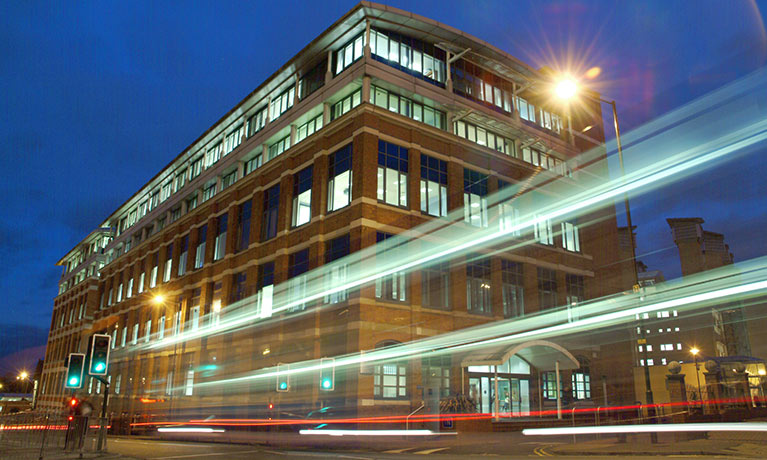 Outside of the William Morris building at night