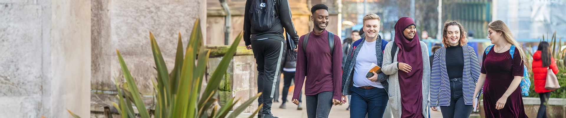 Students walking together smiling
